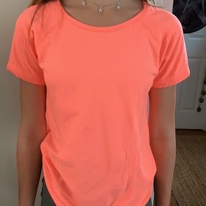 An orange tee great for any activity!